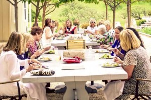 WIGS members and PHP staff enjoy delicious food and cookies prepared by Mila Hart, Heidi Rabel, and Gerry Shepherd for the WIGS annual luncheon held on April 10.