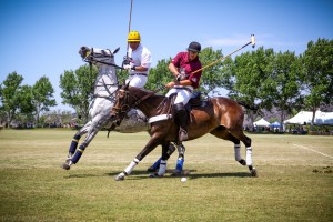 Mariano Obregon of Team Happy Canyon rides Memo Gracida of Team Platinum Performance off the ball during the 2013 edition of the Santa Ynez Valley Polo Classic.
