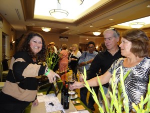 ennifer Mlodzik of Martian Vineyard pours some 2012 Tempranillo for Theresa and Manuel Valdés at the 7th Annual Vino de Sueños Wine Release Celebration.