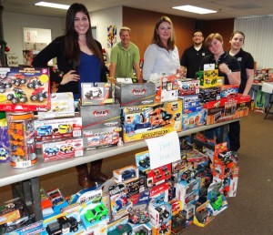  Volunteers from Christensen & Drake, C.P.A.s prepare for PHP’s 2014 Christmas Fulfill-A-Wish Program by decorating the Christmas Boutique space which was donated by Mark Mattingly of Pacifica Commercial Realty.